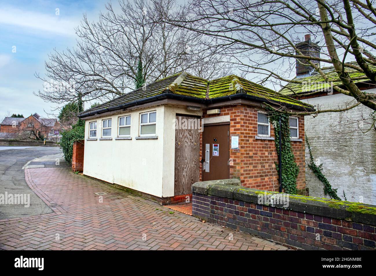 The closed and abandoned public toilet in Middlewich Cheshire UK Stock Photo