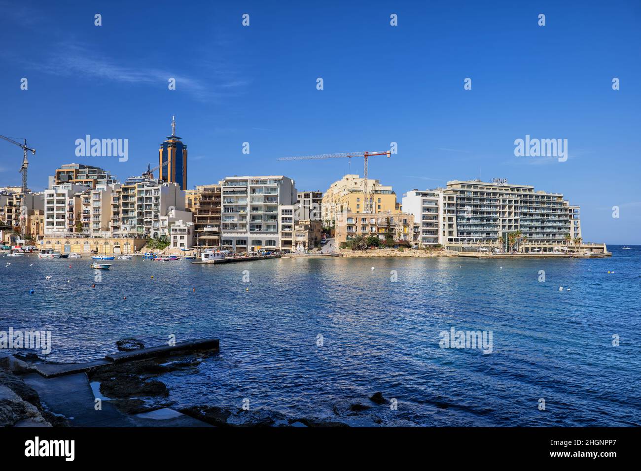 Malta, St Julian town (San Giljan) skyline and sea bay. Stock Photo