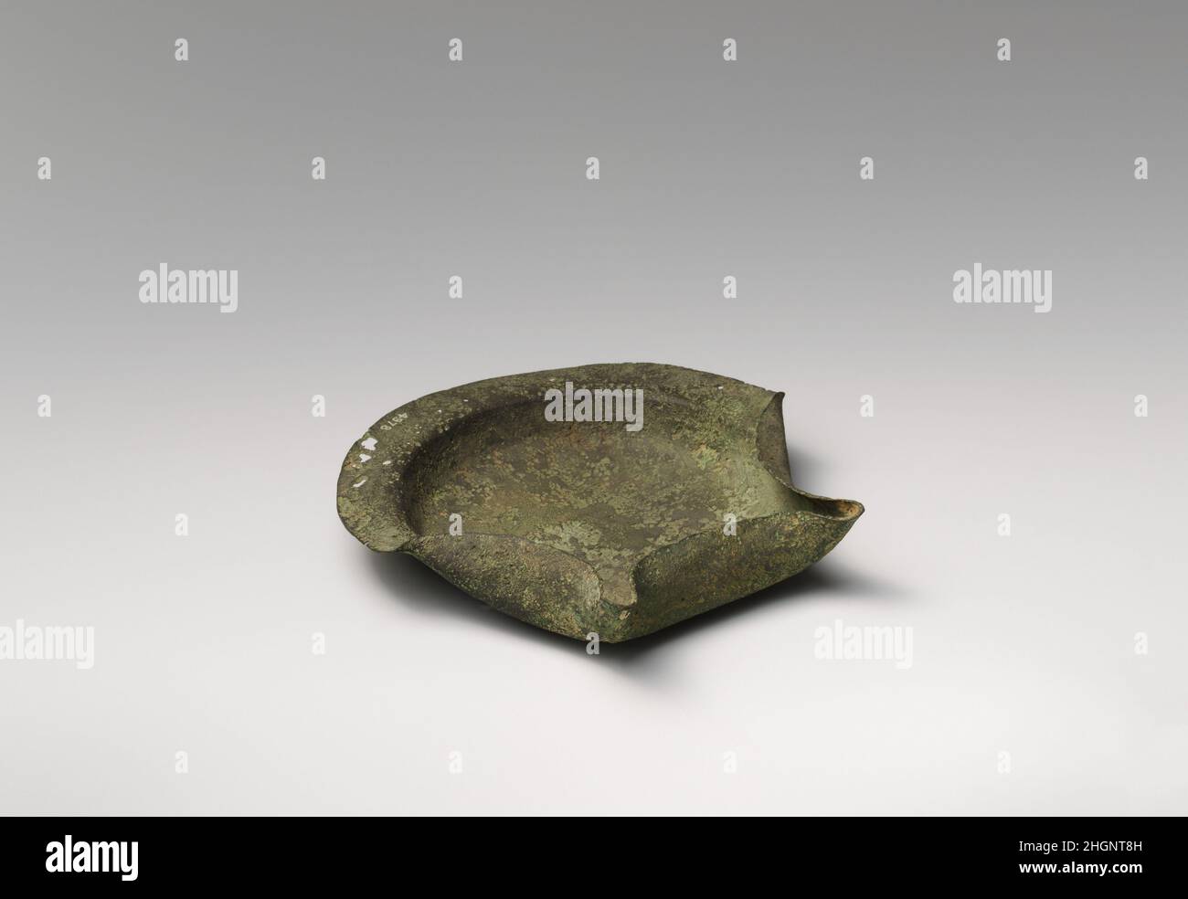 Bronze saucer-shaped lamp 6th–5th century B.C.. Bronze saucer-shaped lamp. 6th–5th century B.C.. Bronze. Cypro-Archaic or Cypro-Classical. Bronzes Stock Photo