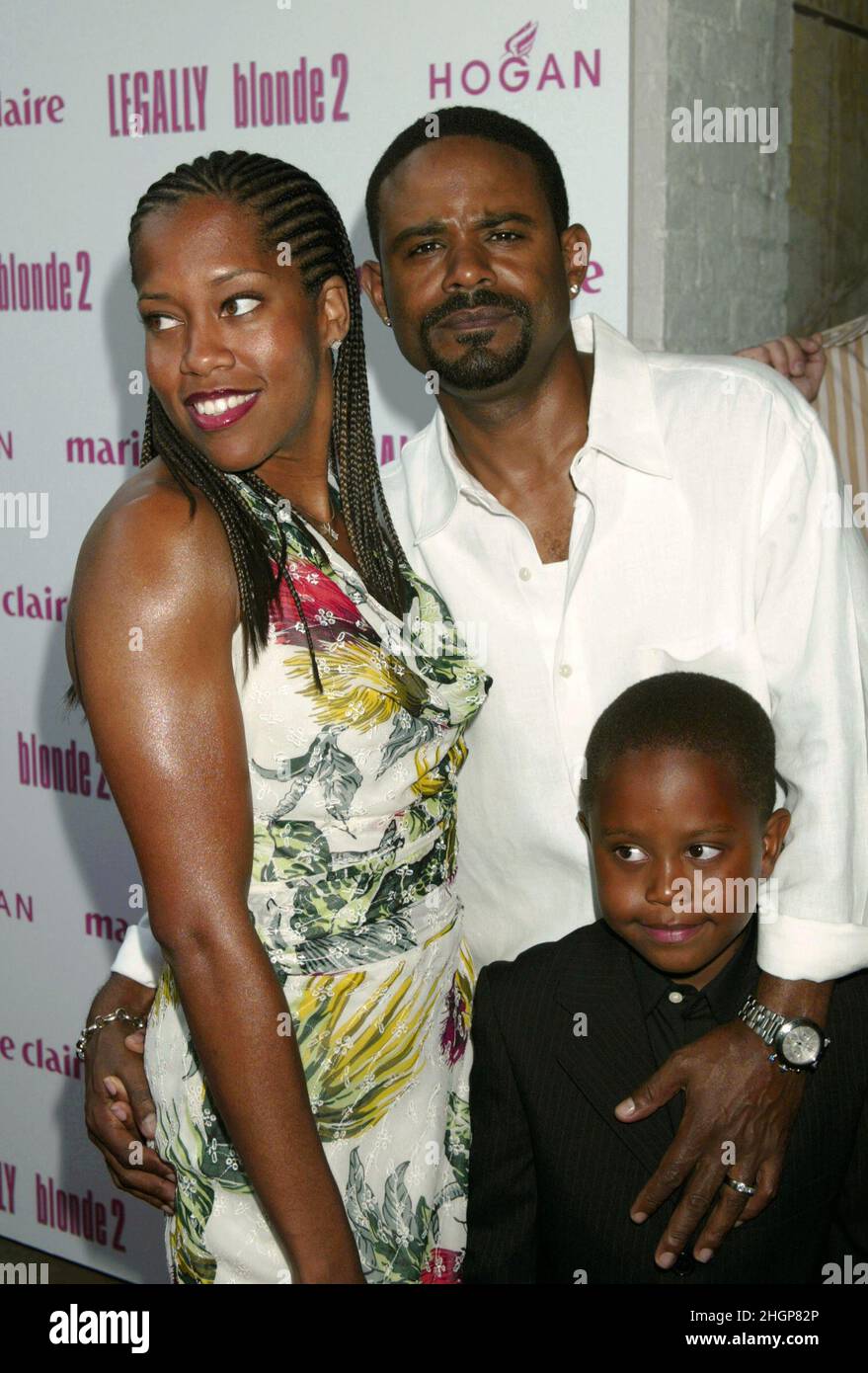 **FILE PHOTO** Regina King's Son Dies By Suicide. Regina King, husband Ian Alexander and son Ian Alexander Jr attend the premiere of 'Legally Blonde 2: Red White & Blonde' at United Artists Southampton Theater in Southampton, NY on June 28, 2003. Photo Credit: Henry McGee/MediaPunch Stock Photo