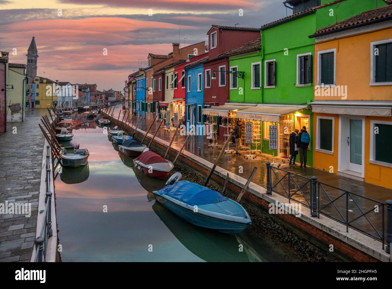 Sunset over a canal on Burano, Venice, Italy Stock Photo