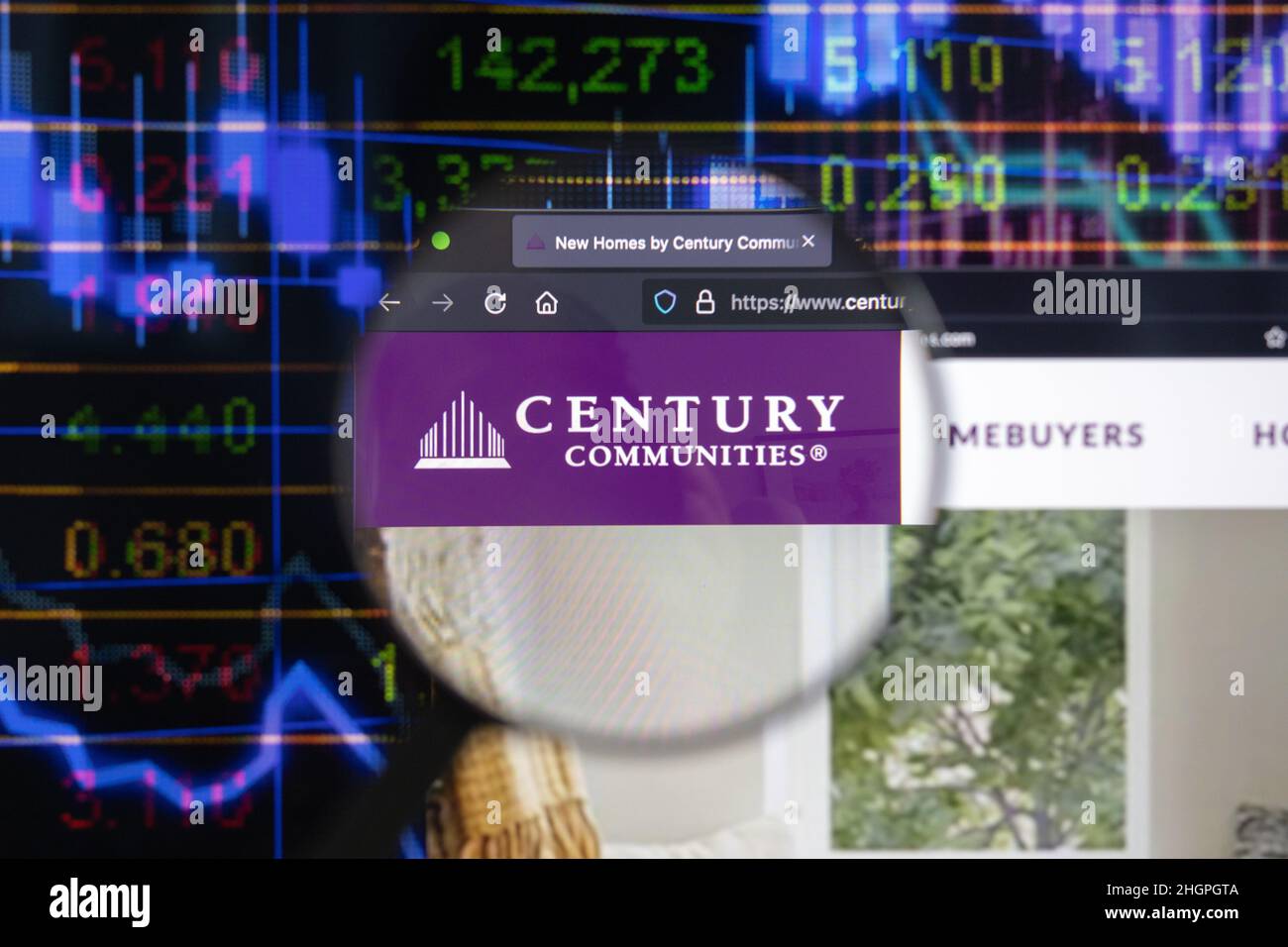 Century Communities company logo on a website with blurry stock market developments in the background, seen on a computer screen Stock Photo