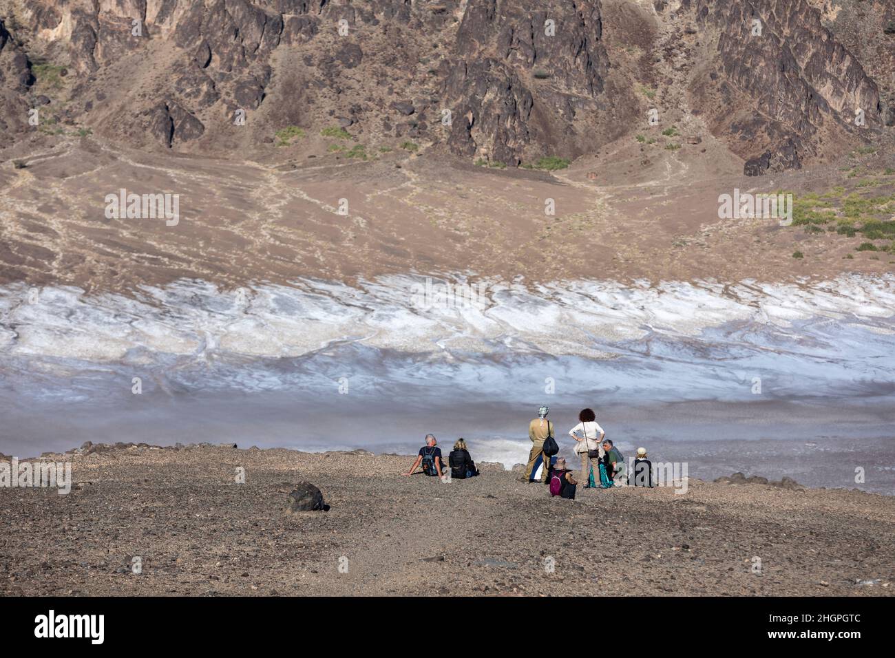 Wahba crater, Saudi Arabia, 4th January 2022: tourists at the crater of dormant volcano Stock Photo
