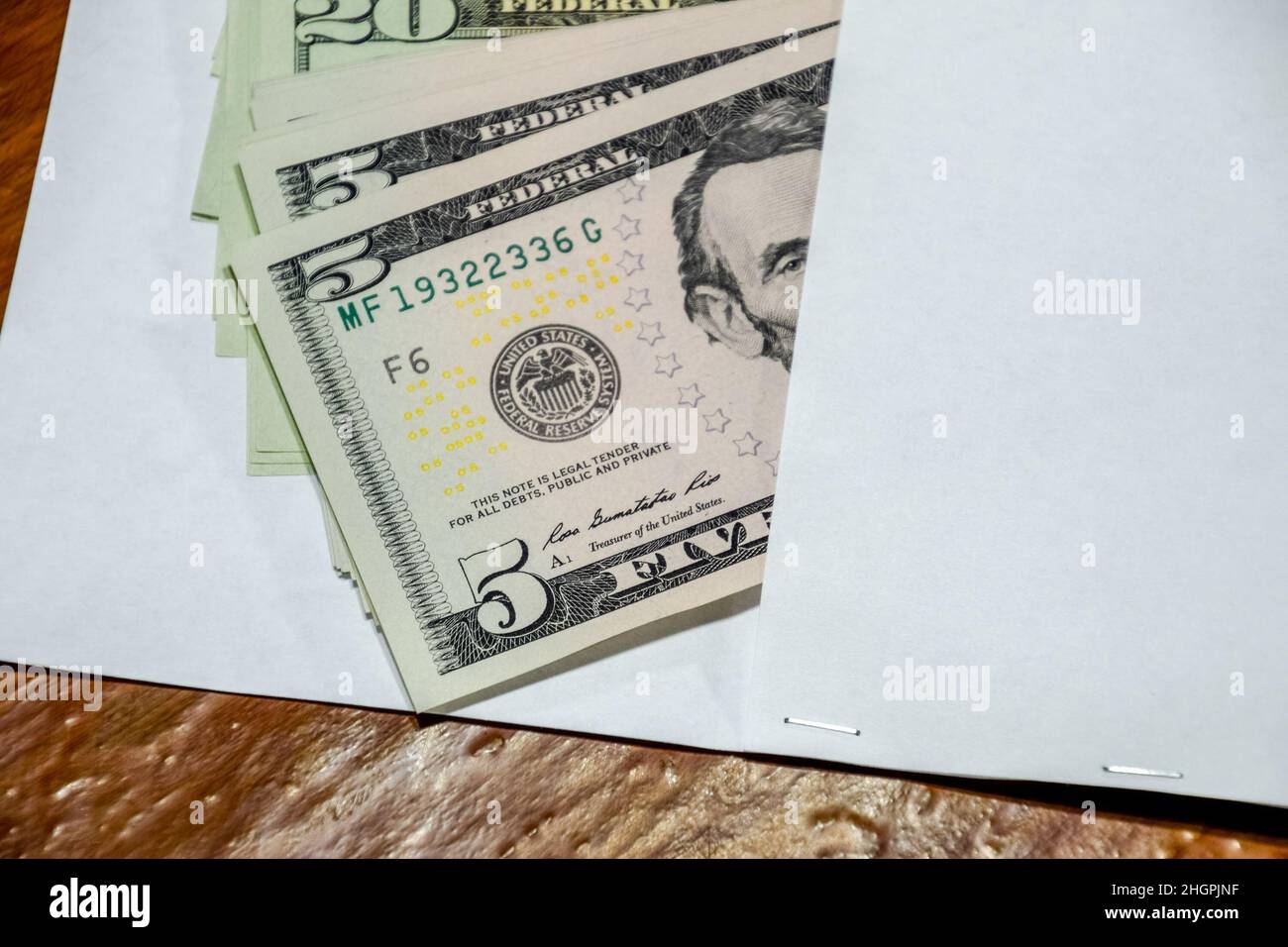 Dollars on the table with an envelope. Money in an envelope. U.S