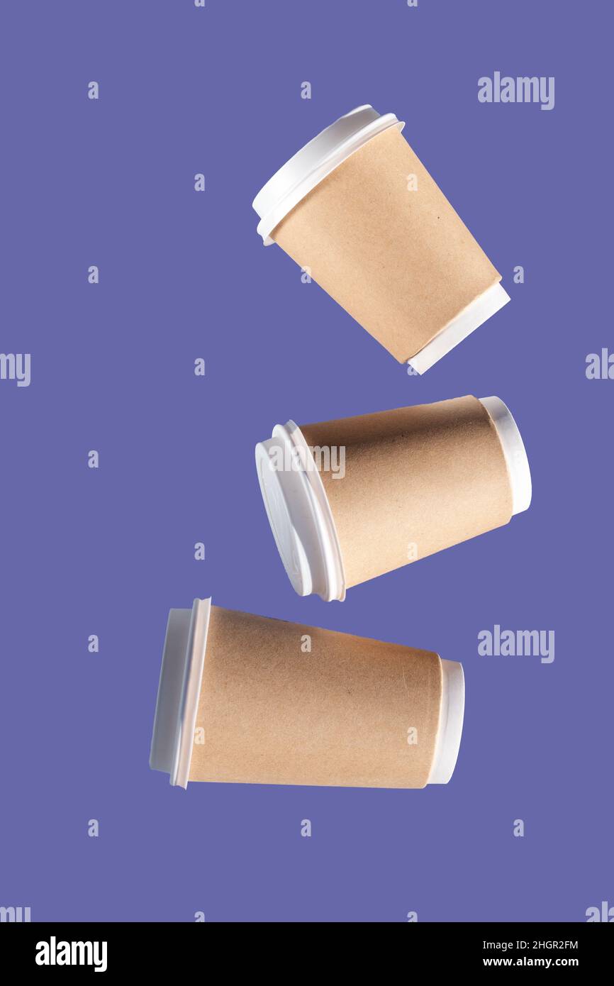 group of paper cups levitate against very peri background, greenwashing ...