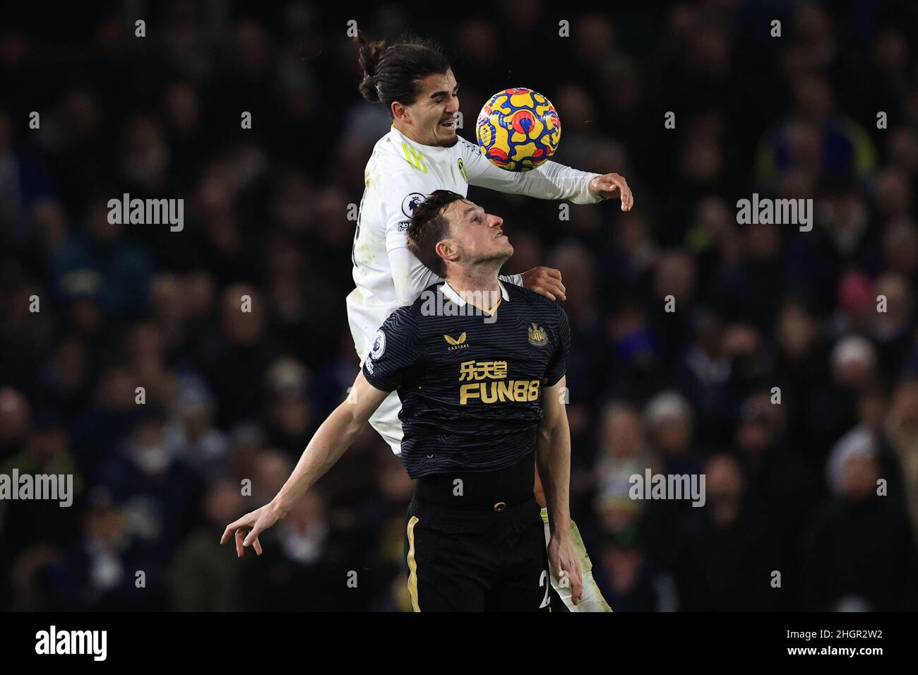 Leeds, UK. 22nd Jan, 2022. Pascal Struijk #21 of Leeds United and Chris Wood #20 of Newcastle United battle for the ball during the Premier League fixture Leeds United vs Newcastle United at Elland Road, Leeds, UK, 22nd January 2022 Credit: News Images /Alamy Live News Stock Photo