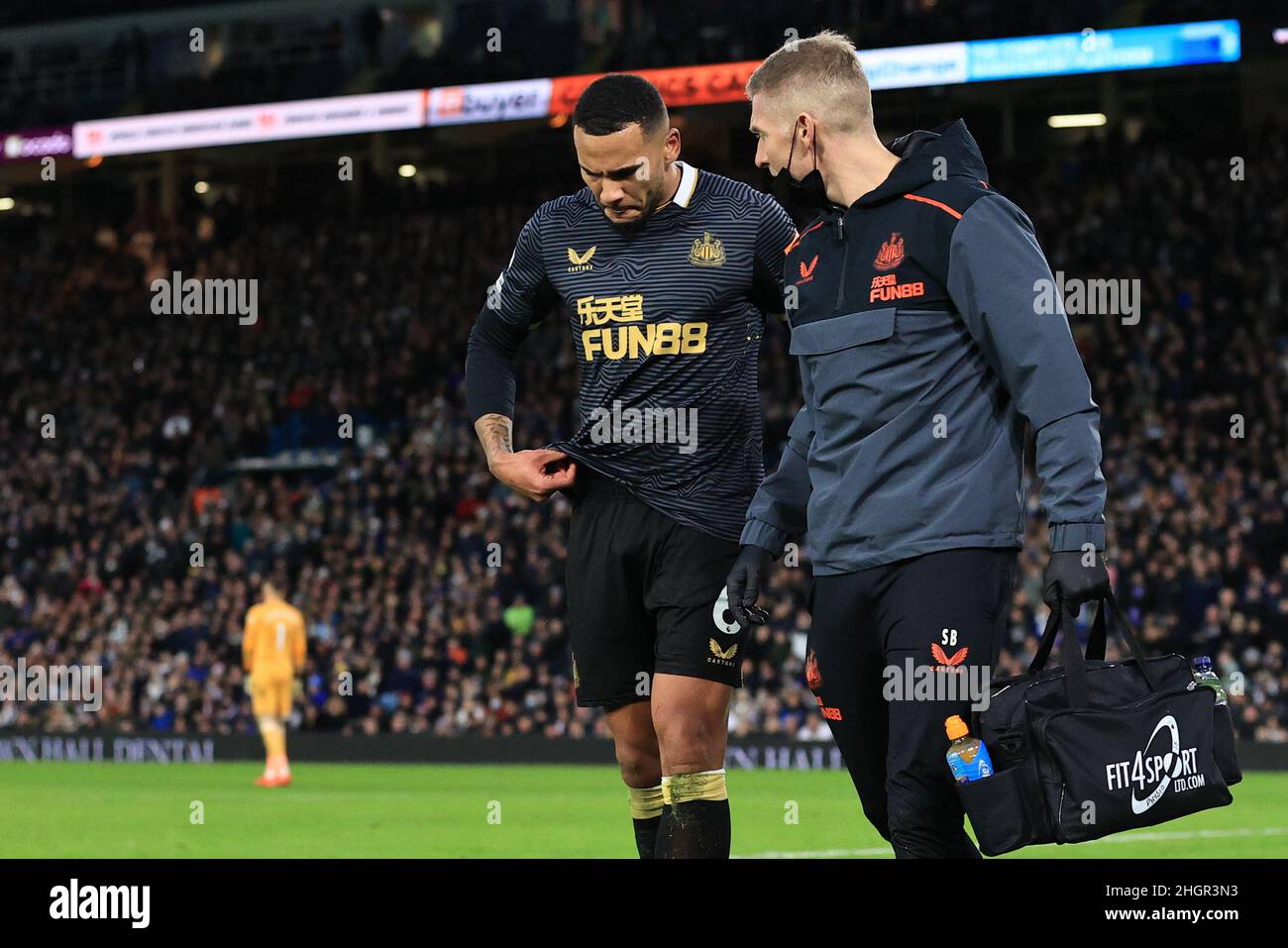 Leeds, UK. 22nd Jan, 2022. Jamaal Lascelles #6 of Newcastle United limps off injured after being substituted during the Premier League fixture Leeds United vs Newcastle United at Elland Road, Leeds, UK, 22nd January 2022 Credit: News Images /Alamy Live News Stock Photo