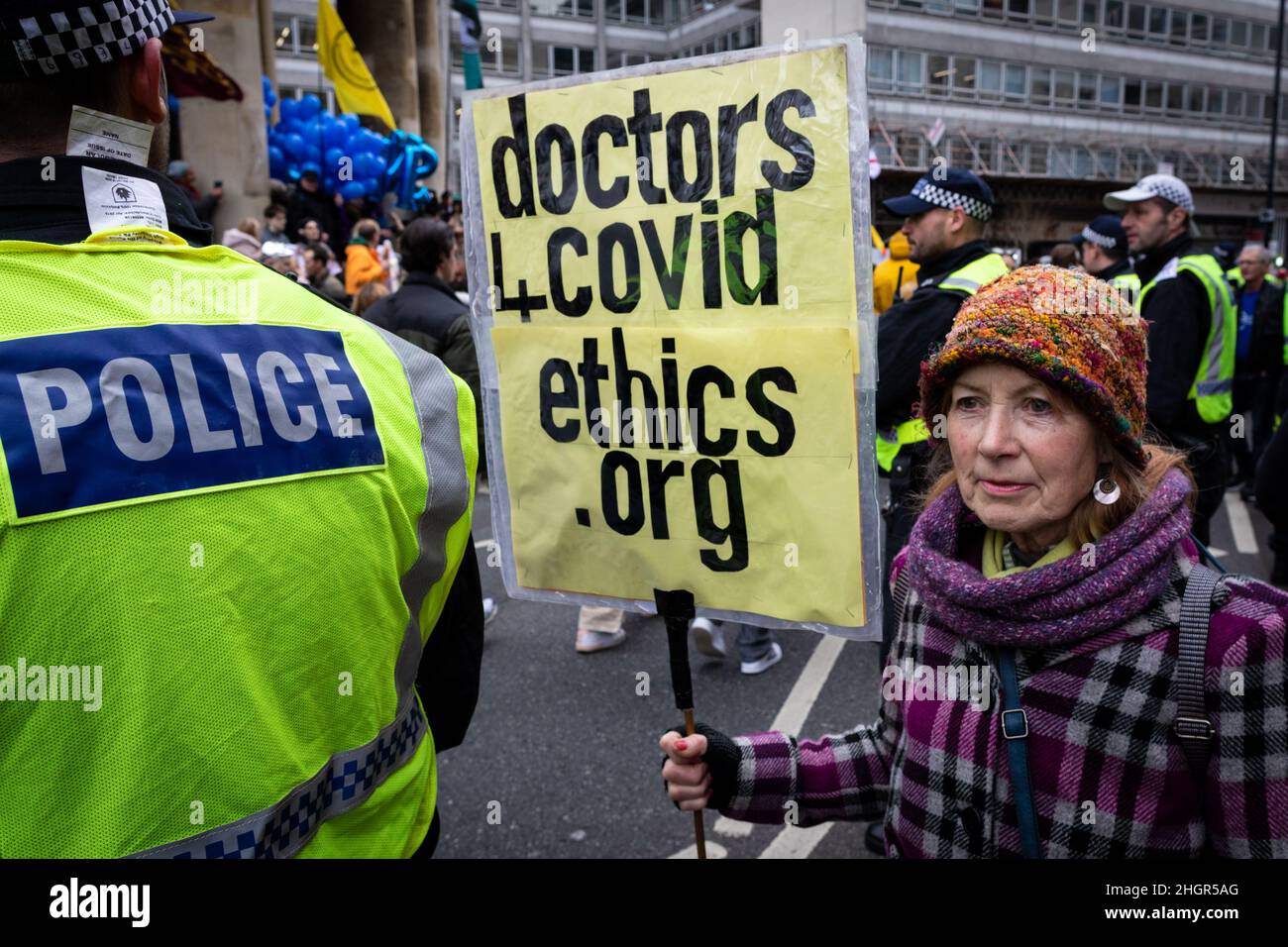 London, UK. 22nd Jan, 2022. A protester with a placard waits the start of the rally. As the mandate to get vaccinated against COVID-19 draws ever closer NHS workers join the protest. The anti-lockdown demonstration was organised by the World Wide Rally For Freedom movement. Credit: Andy Barton/Alamy Live News Stock Photo