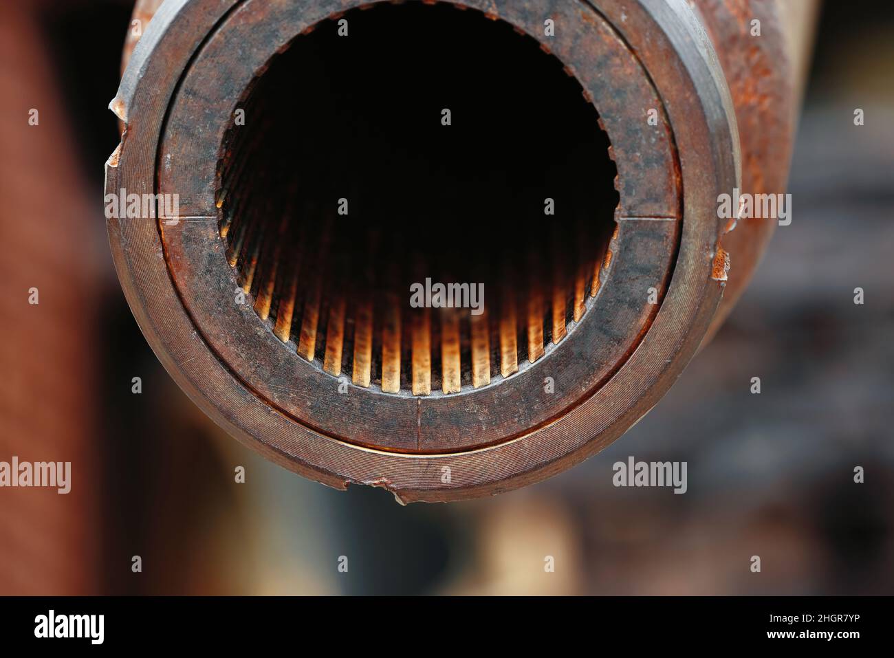 A big gun. The rifled gun of the tank. Close-up of a tank gun barrel with rifling. Abstract background of the armed conflict. Stock Photo