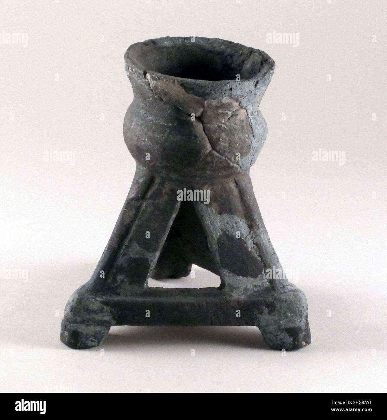 Stand Etruscan Three legs, terminating in shape of small cup.. Stand