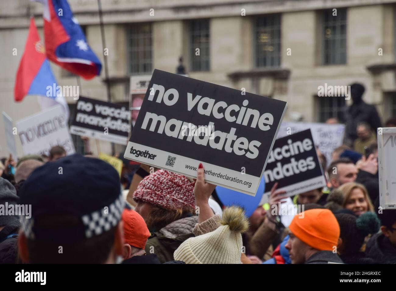 London, UK 22nd January 2022. Protesters outside Downing Street. Thousands of people marched through Central London in protest against mandatory vaccines for NHS staff, face masks, covid vaccines, vaccination passports and various other grievances fuelled by conspiracy theories. Credit: Vuk Valcic / Alamy Live News Stock Photo