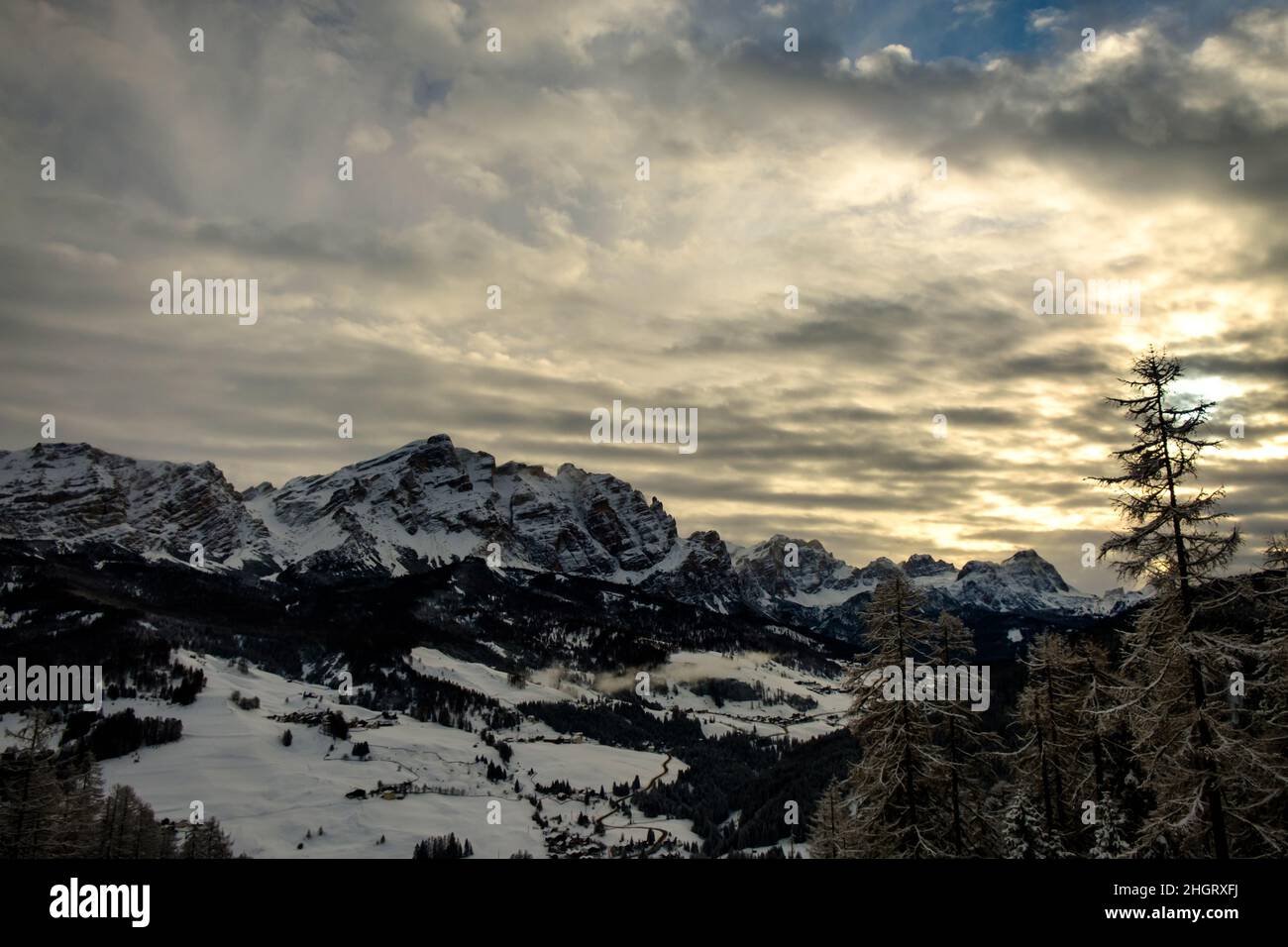 Clouds carrying snow in the italian alps Stock Photo - Alamy
