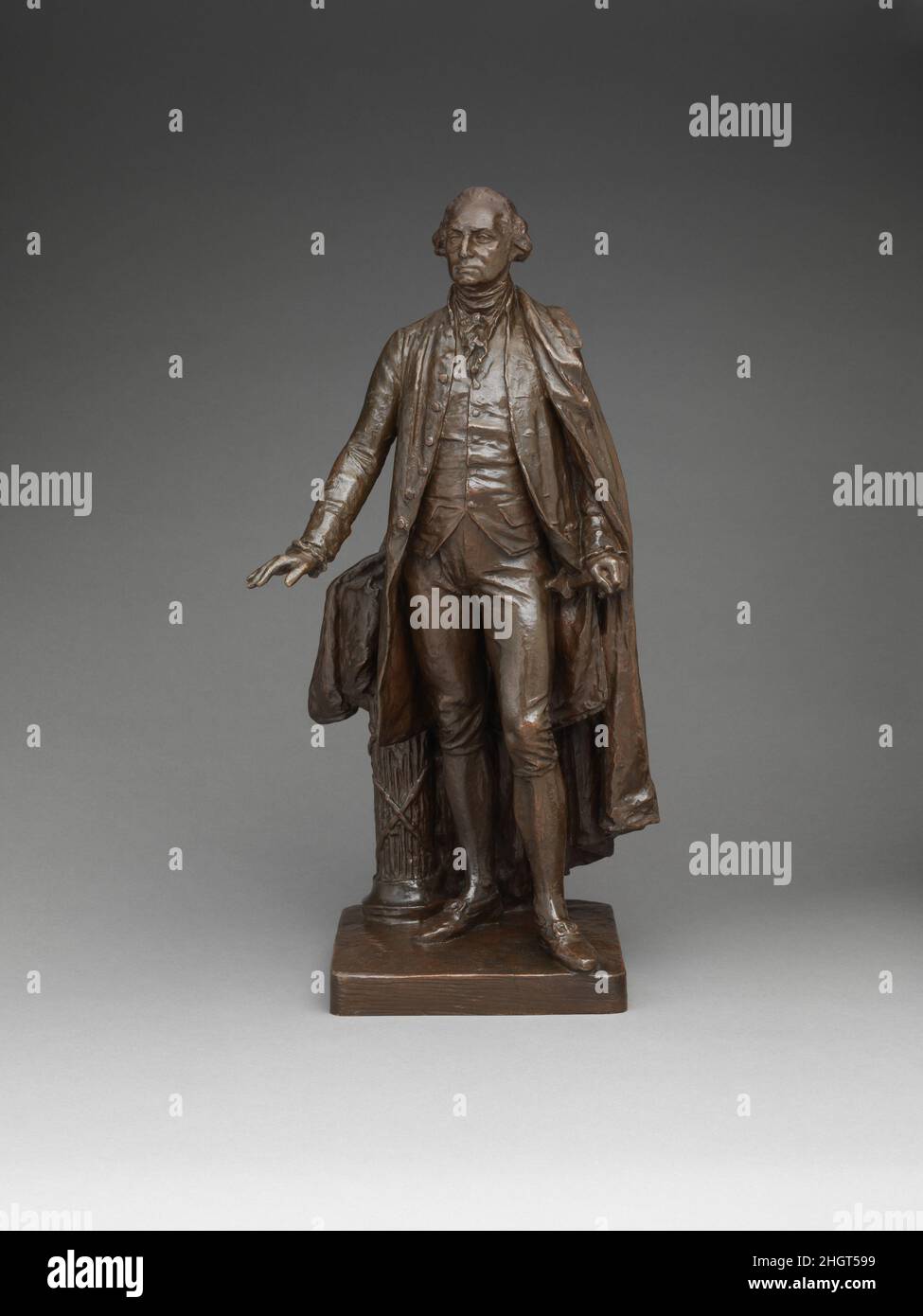 George Washington 1882; cast ca. 1911 John Quincy Adams Ward American This statuette was cast after the final sketch model for Ward’s monumental statue of George Washington (1732–1799), erected on the front steps of the old Sub-Treasury Building (now Federal Hall) at Wall and Broad Streets in New York City. The monument stands where Washington took his oath of office as the first president of the United States in 1789. Here, Washington is shown right after being sworn in, his right hand extended to the spot where the Bible would have been.. George Washington. John Quincy Adams Ward (American, Stock Photo