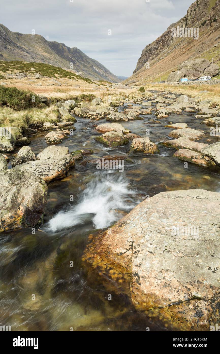 mountain stream and pass running through the Snowdonia mountains Wales Stock Photo
