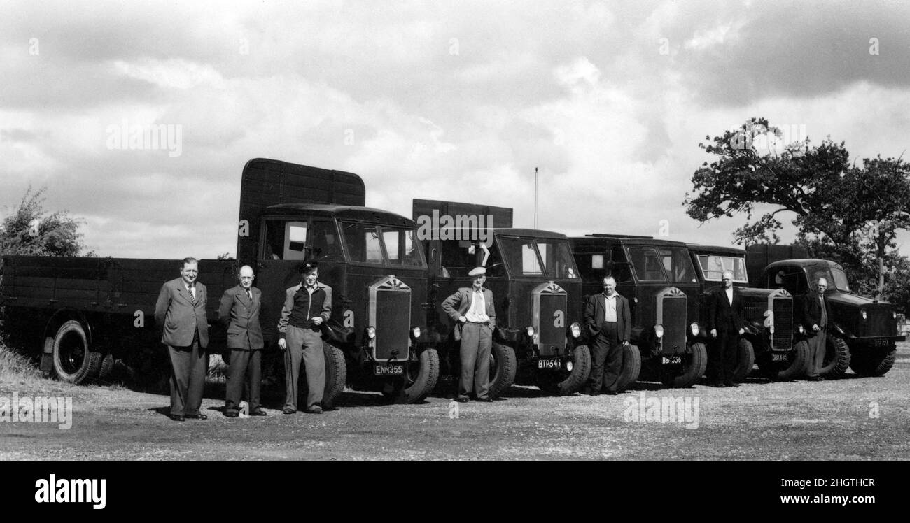 The men and vehicles of the transport department of the British Road Services  Portsmouth, Hampshire, England, UK - transport manager with drivers and Albion KL 127 Lorries photograph taken late June 1949. Stock Photo