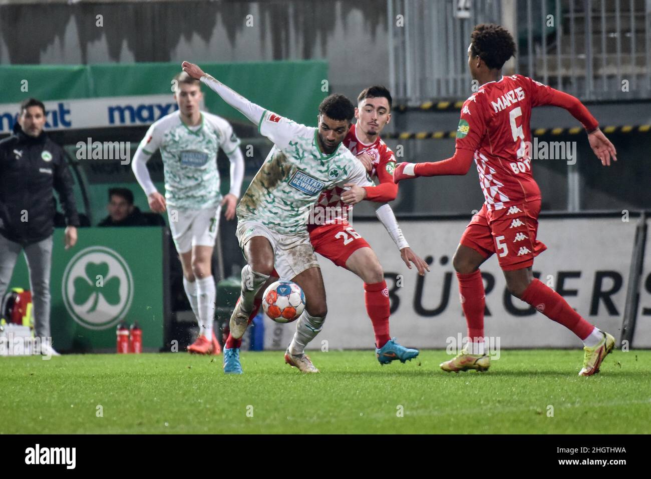 Germany ,Fuerth, Sportpark Ronhof Thomas Sommer - 22 Jan 2022 - Fussball, 1.Bundesliga - SpVgg Greuther Fuerth vs. FSV Mainz 05  Image: (fLTR) Timothy Tillman (SpVgg Greuther Fürth,21), Paul Nebel (Mainz, 26)  DFL regulations prohibit any use of photographs as image sequences and or quasi-video Stock Photo