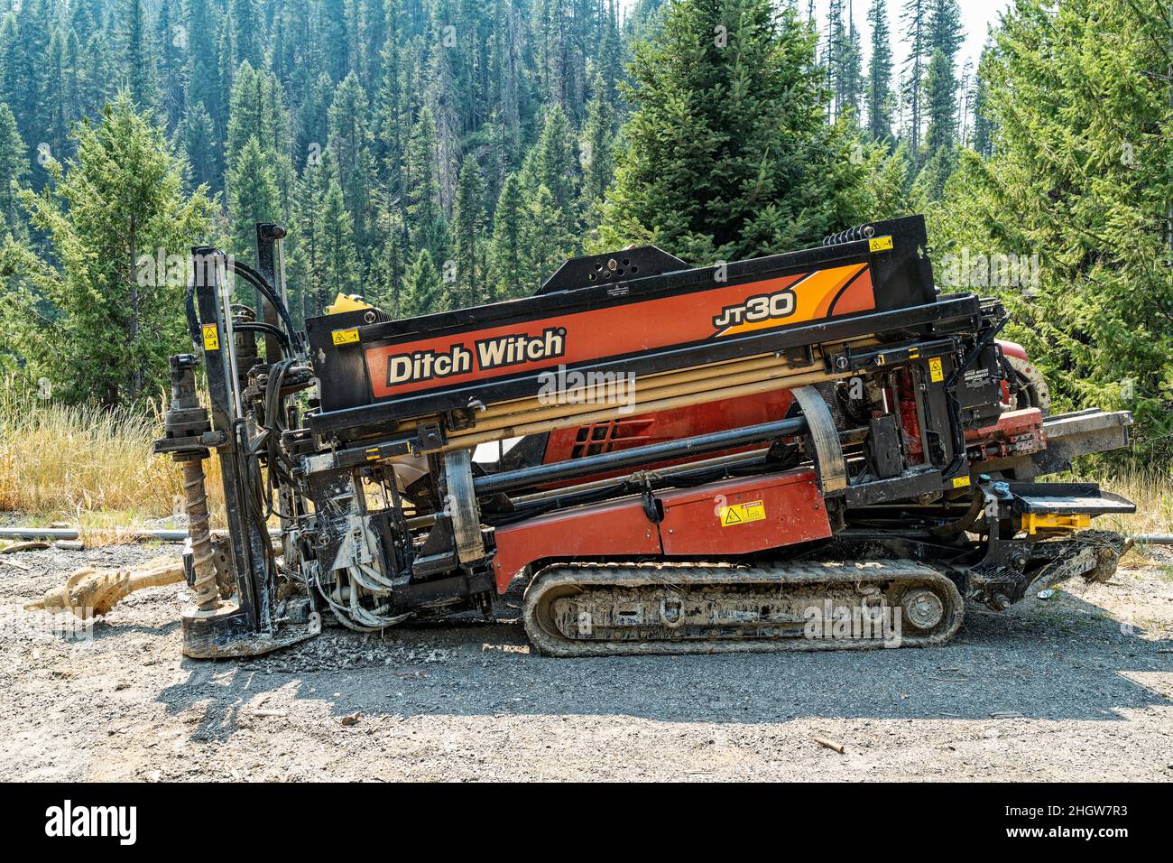 A Ditch Witch JT30 Directional Drill resting at the side of the road in