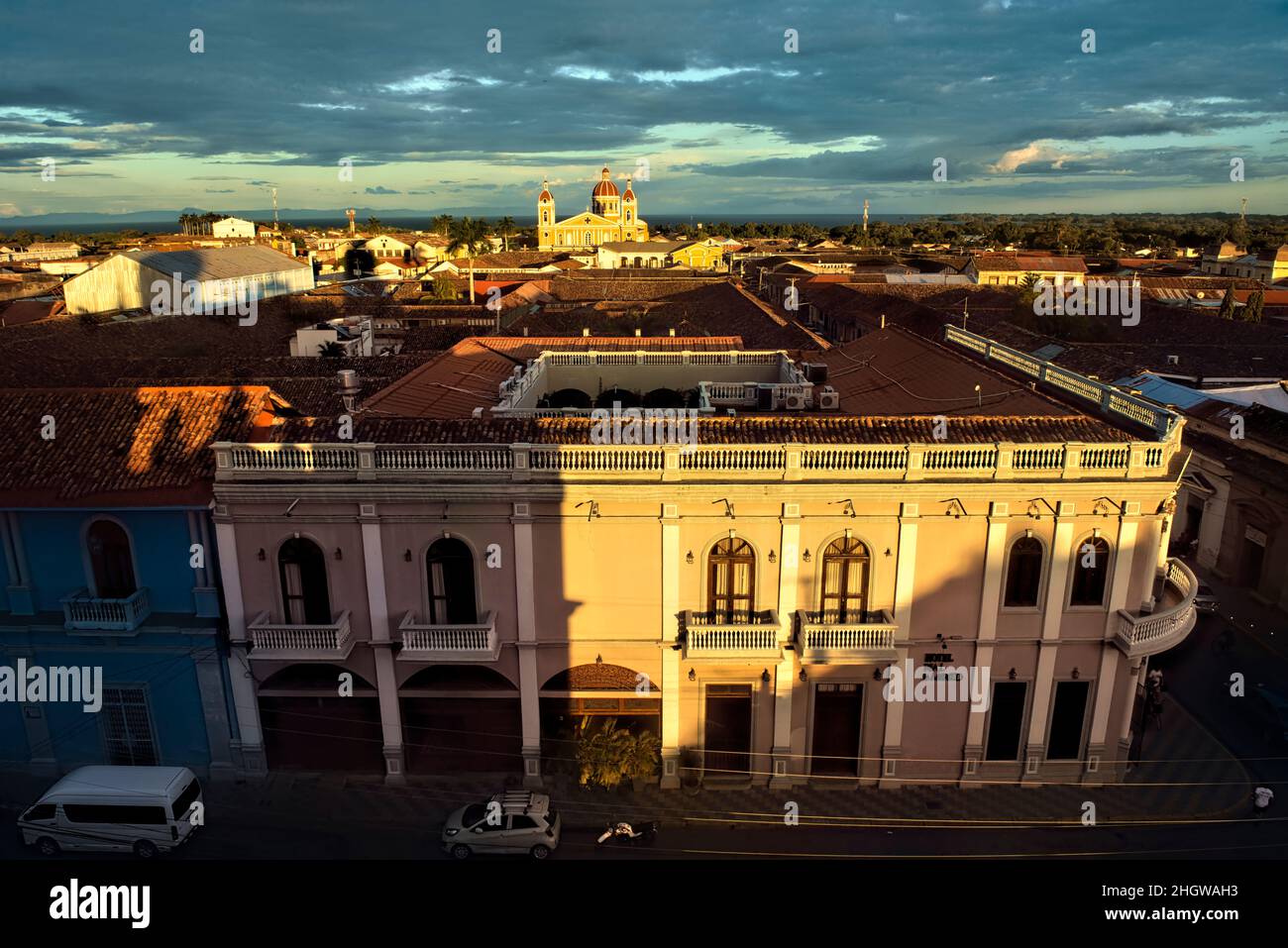 The beautiful neoclassical Granada Cathedral  and the roofs of colonial Granada, Nicaragua Stock Photo