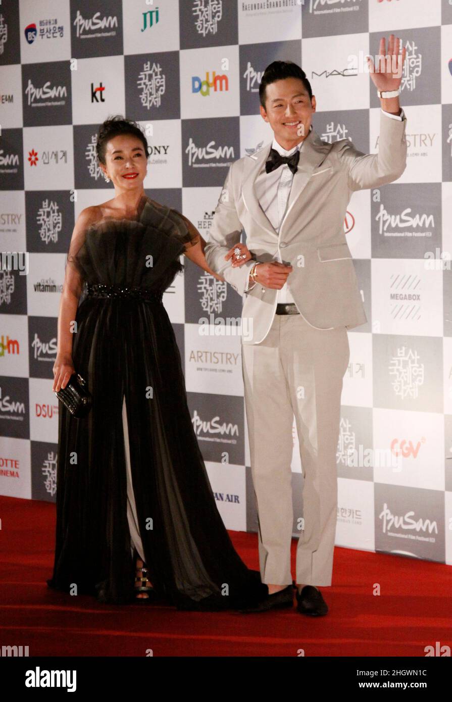 October 4, 2012 - Busan, South Korea : Actress Cho Min Soo and Actor lee Jung Jin pose for photo call during the 17th Busan International Film Festival Opening red carpet event at the Busan Cinema Center. Along with the now inevitable galaxy of stars promoting blockbusters from across Asia, this year's Busan International Film Festival will screen a North Korean film for the first time in almost a decade as well as six classic Afghan movies that were hidden in a wall to save them from the Taliban. Stock Photo
