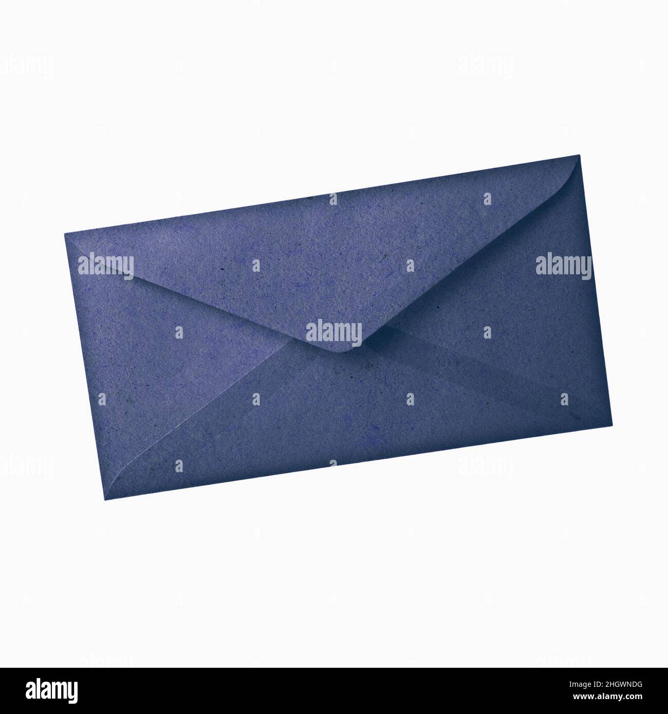 Navy blue envelope isolated on white background. Kraft paper with subtle fibers. Vintage style. Stock Photo