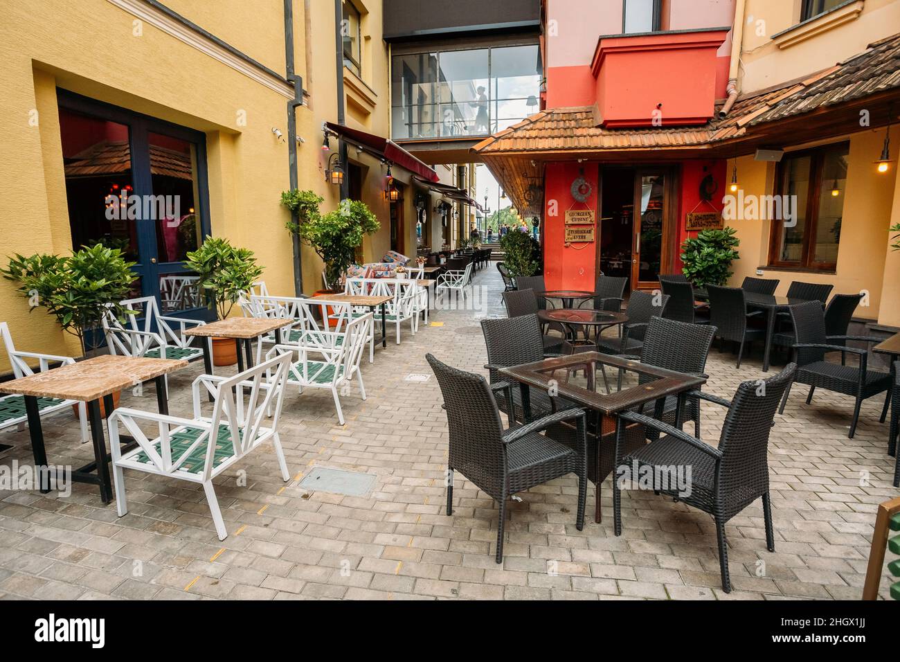 Cozy Outdoor Cafes In The Narrow Streets Of Old Town Stock Photo Alamy