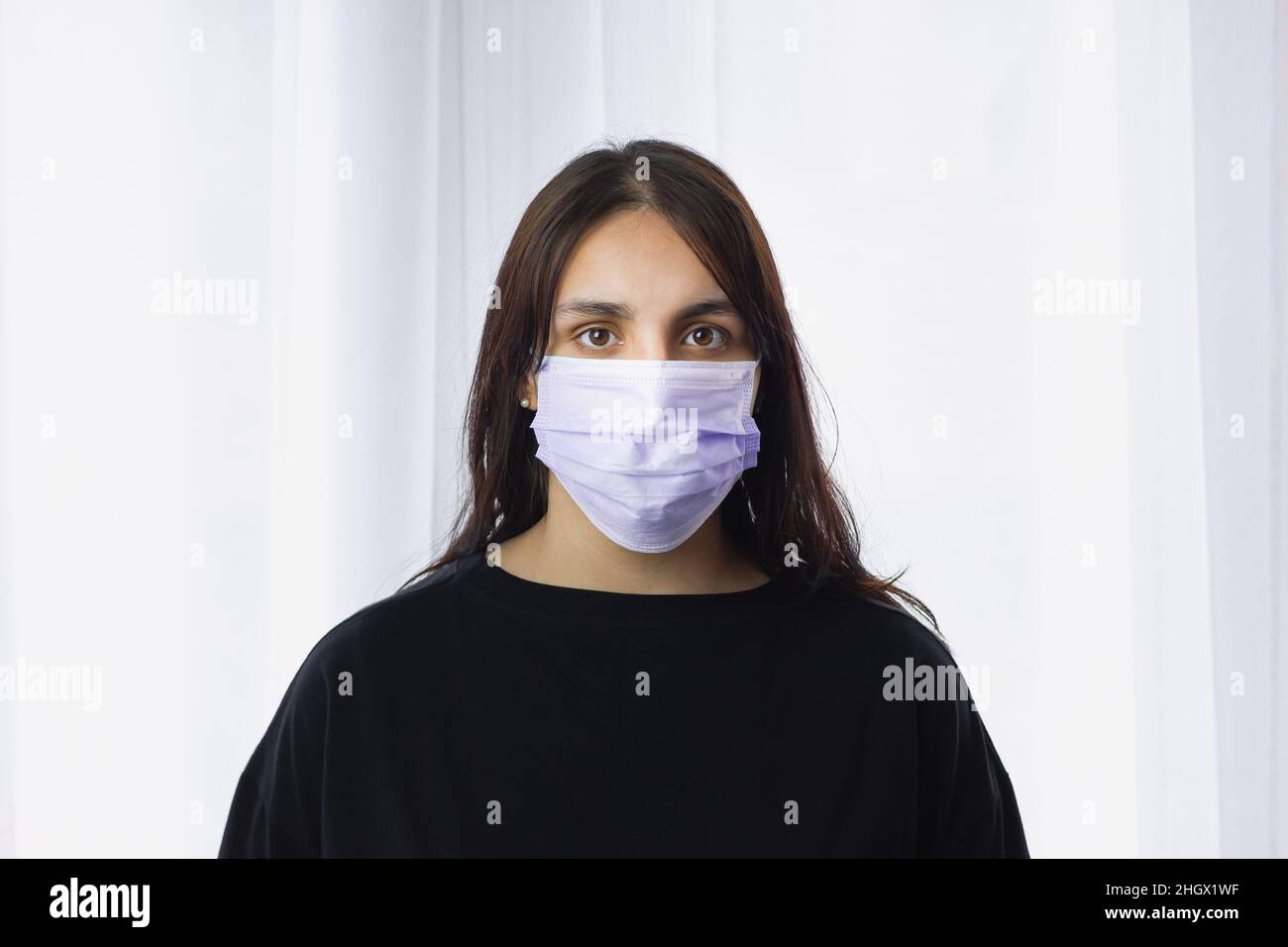Mature woman wearing facial mask hi-res stock photography and images ...
