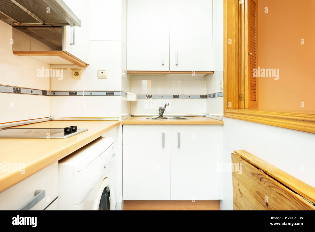 Small wooden drawers, part of wooden furniture in kitchen Stock Photo -  Alamy