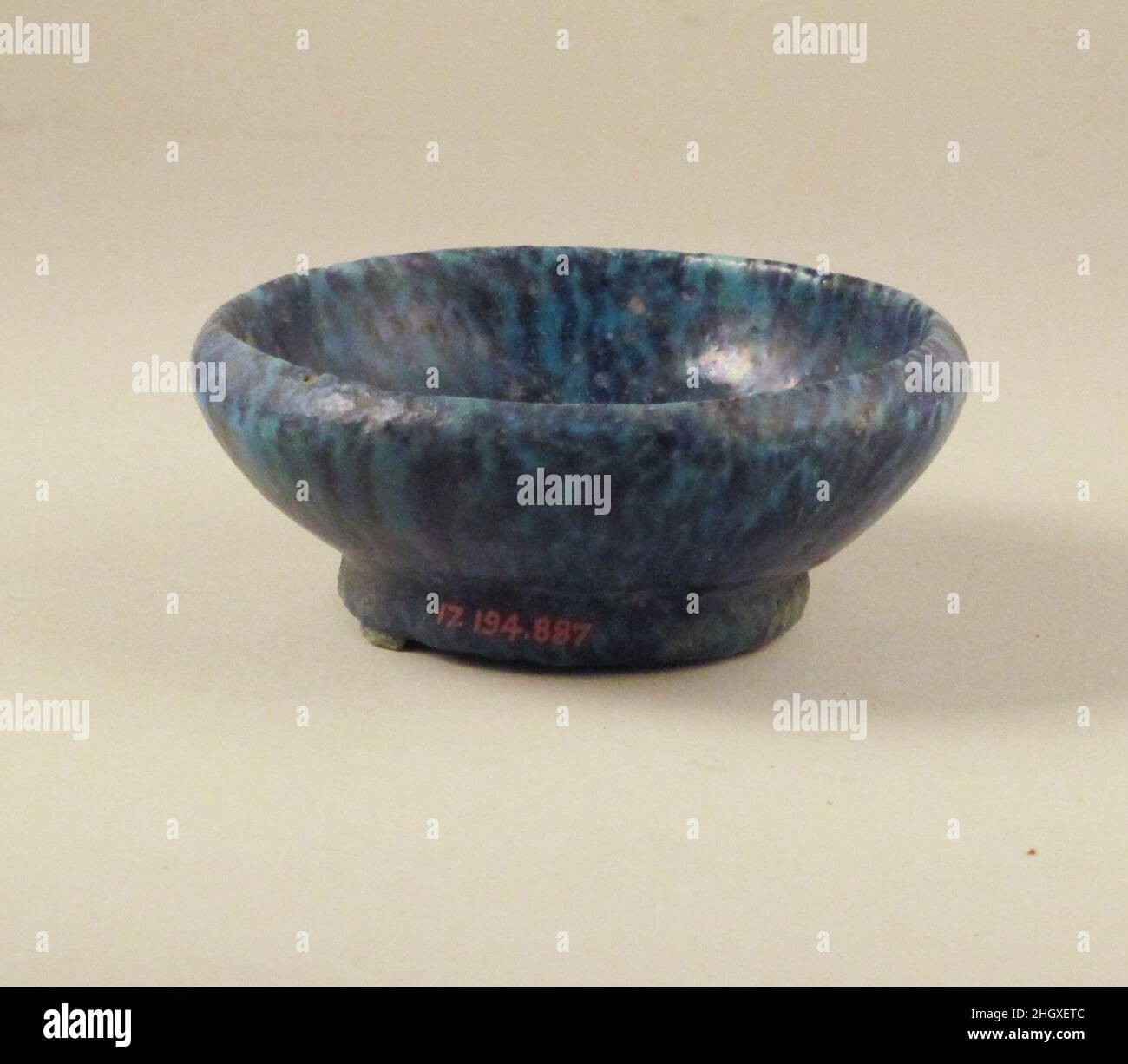 Saucer Roman Pale blue glazed saucer with close darker blue veining