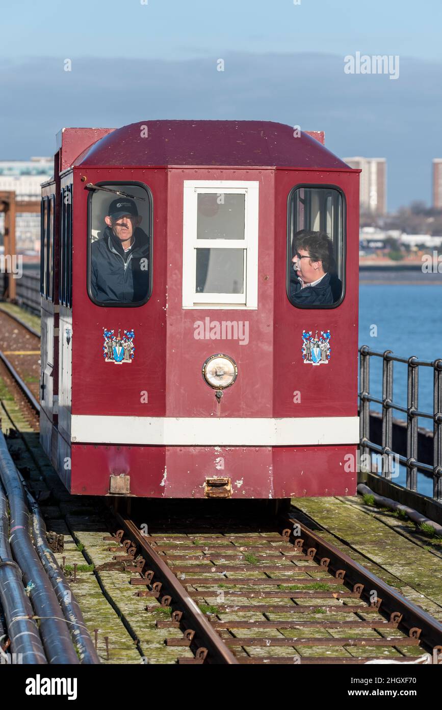 Vintage battery powered single passenger car on Southend Pier railway, used as a maintenance and goods delivery to the end of the pier. Number 1835 Stock Photo