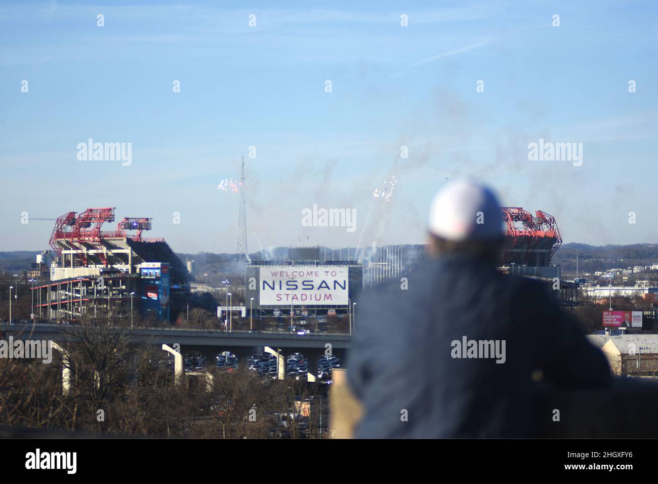 (Nashville, TN USA) January 22, 2022- Spectators gather outside of Nissan Stadium to watch the fireworks before kickoff. The Tennessee Titans take on the Cincinnati Bengals.(Camden Hall/Alamy Live News) Stock Photo
