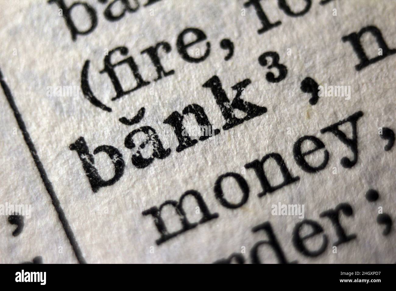 Word 'bank' printed on dictionary page, macro close-up Stock Photo