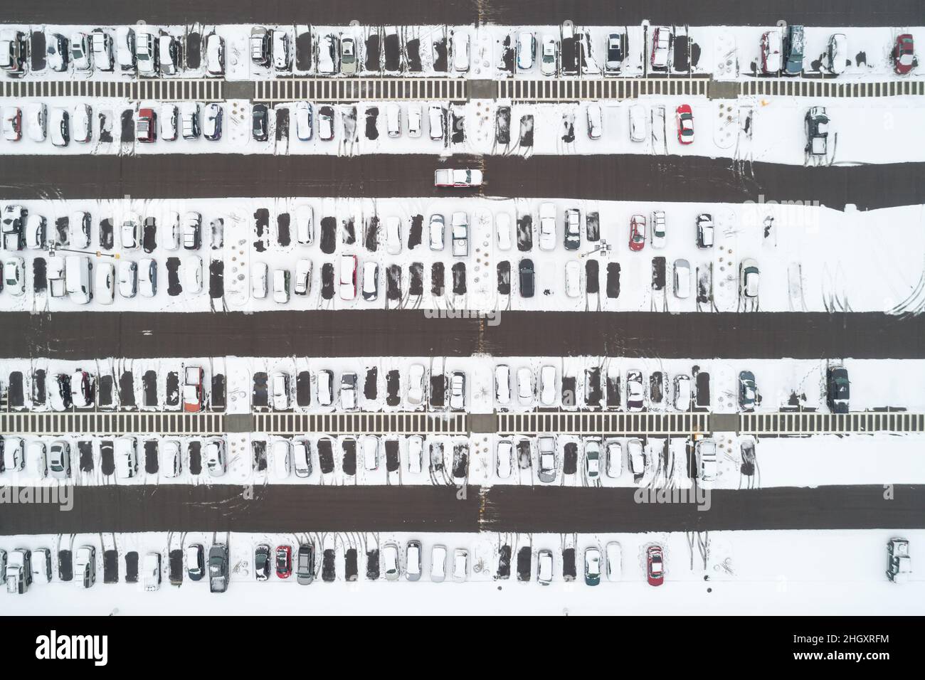 Parking lot full of cars in snow Stock Photo - Alamy