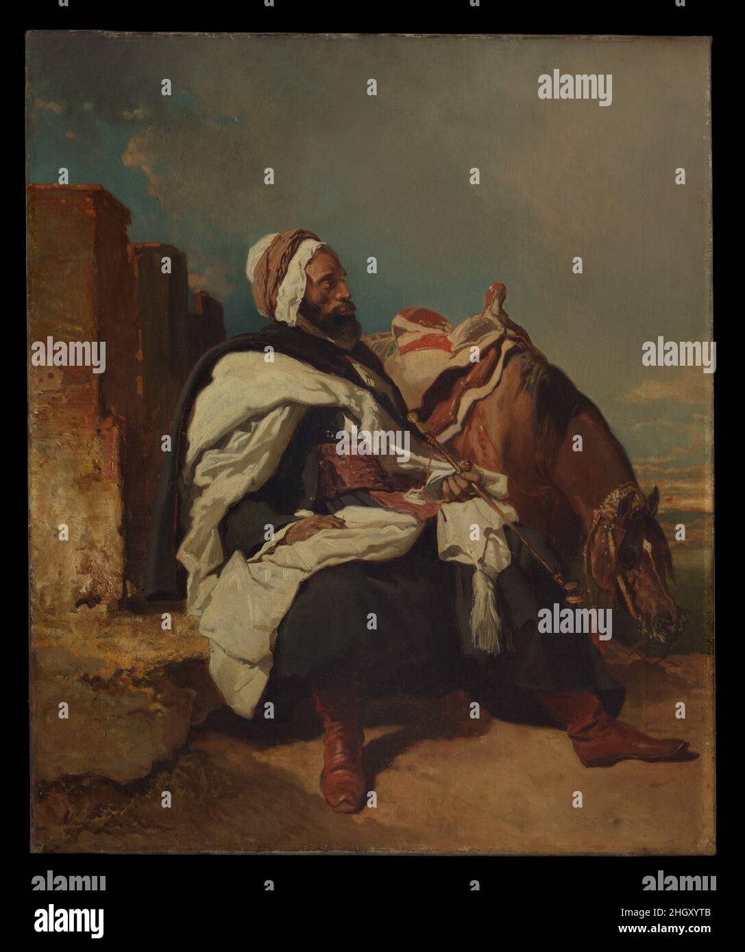 Seated Arab Man with Horse possibly ca. 1850–58 Alfred Dedreux Dedreux, a popular painter of equestrian subjects, made at least two portraits of horses belonging to the Algerian military and religious leader ‘Abd al-Qadir (1808–1863) in the 1850s. Although a foe of the French following their invasion of Algeria in 1830, ‘Abd al-Qadir eventually earned the respect and admiration of his adversaries. It cannot be established with certainty that this is a portrait, yet the man depicted resembles the chieftan, whose likeness was widely disseminated through paintings, prints, and photographs.. Seate Stock Photo