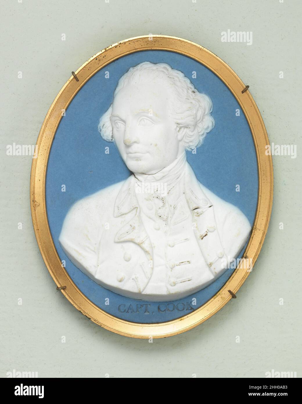 Captain James Cook late 18th century Wedgwood and Bentley Cameo medallions with portrait reliefs were made by Josiah Wedgwood between 1765 and 1795, with Thomas Bentley as his partner from 1769 to 1780. Black basalt and jasper are both types of fine stoneware hard enough for the delicate modeling which distinguishes Wedgwood's portrait cameos of 'Illustious Ancents and Moderns.'. Captain James Cook. British, Etruria, Staffordshire. late 18th century. Jasperware. Ceramics-Pottery Stock Photo