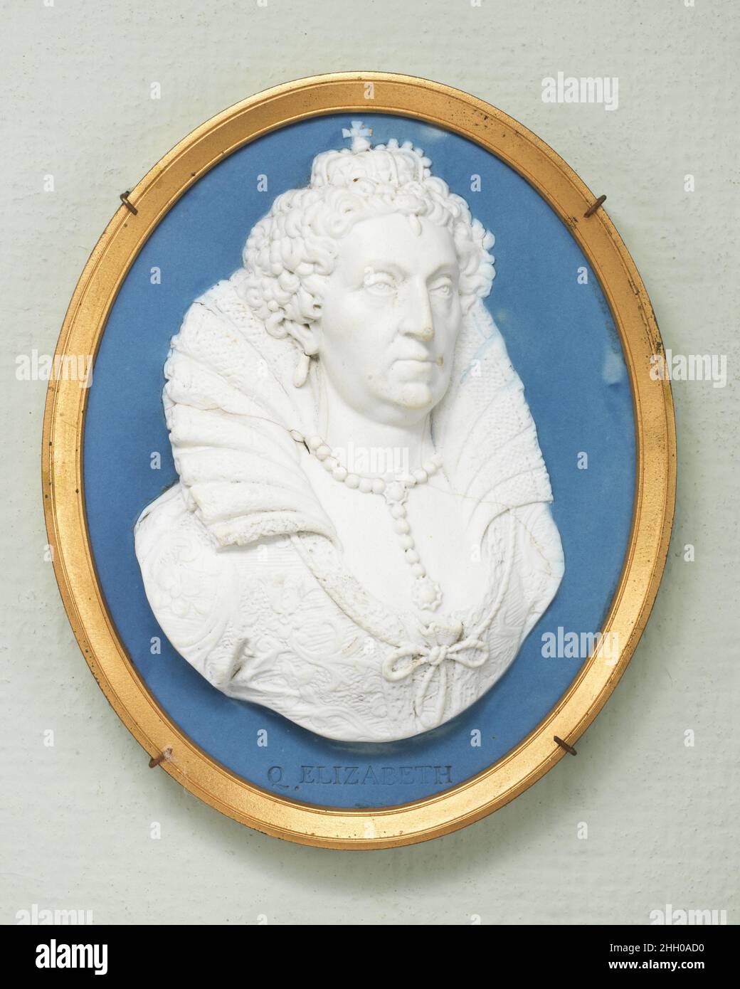 Elizabeth I 18th century Wedgwood and Bentley Cameo medallions with portrait reliefs were made by Josiah Wedgwood between 1765 and 1795, with Thomas Bentley as his partner from 1769 to 1780. Black basalt and jasper are both types of fine stoneware hard enough for the delicate modeling which distinguishes Wedgwood's portrait cameos of 'Illustious Ancents and Moderns.'. Elizabeth I. British, Etruria, Staffordshire. 18th century. Jasperware. Wedgwood and Bentley (British, Etruria, Staffordshire, 1769–1780). Ceramics-Pottery Stock Photo