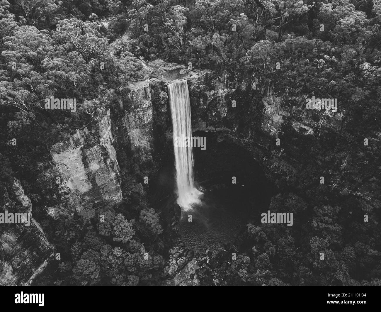 Aerial shot of a waterfall in a valley, Belmore Falls, New South Wales Austalia  Stock Photo