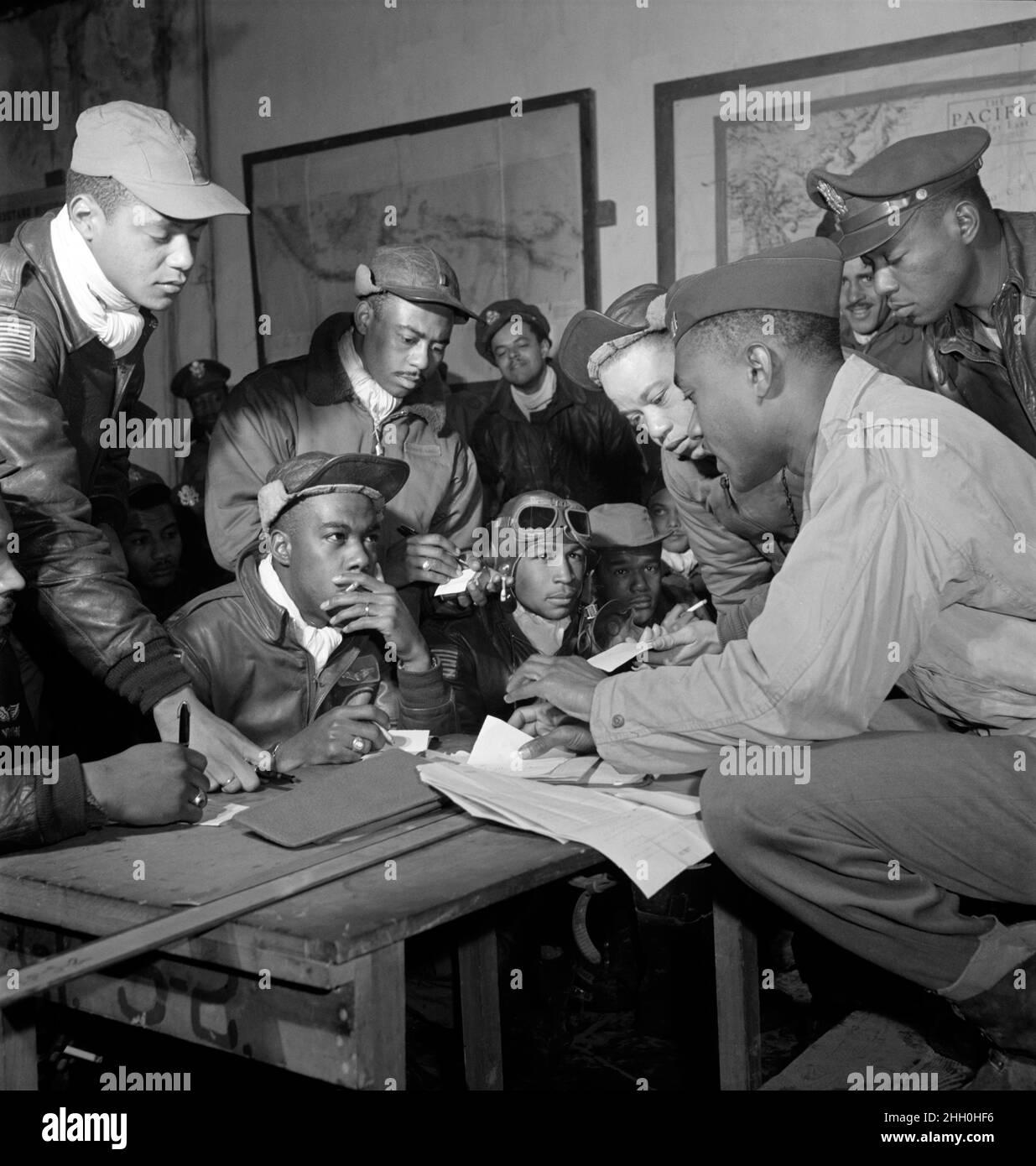 A group of Tuskeegee Airmen (the all black fighter pilot training school) at a briefing in Italy Stock Photo
