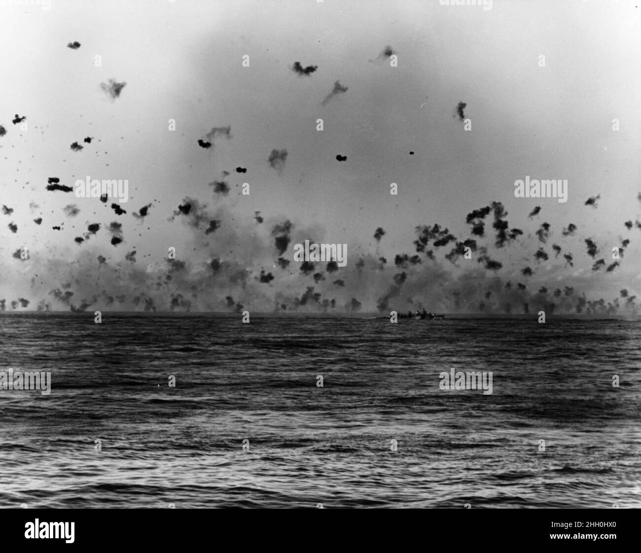 The air full of anti-aircraft fire during a kamikaze attack during the Lingayen Gulf attack in January 1945 Stock Photo