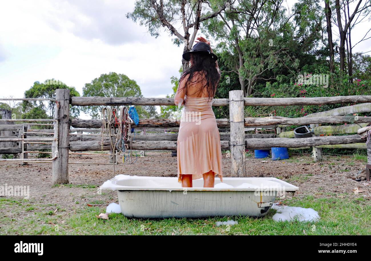 Cowgirl in bath hi-res stock photography and images - Alamy