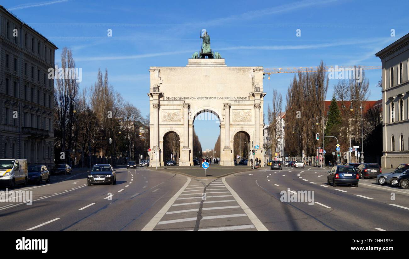 Siegestor, famous 19th-century triumphal arch featuring a bronze sculpture of Bavaria with 4 lions, southern facade, Munich, Germany Stock Photo
