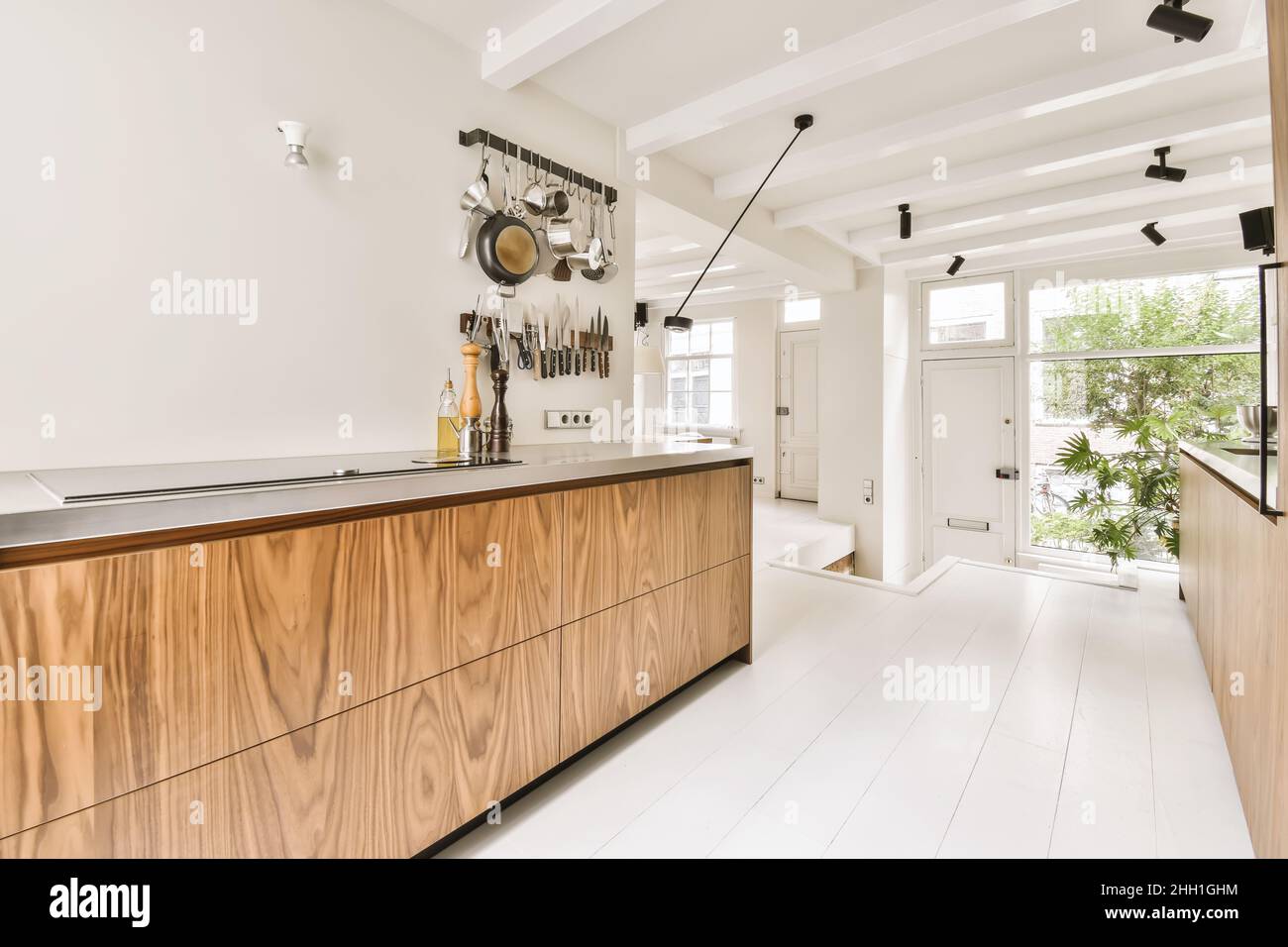 Luxurious and cozy kitchen with a light wooden kitchen set Stock Photo ...