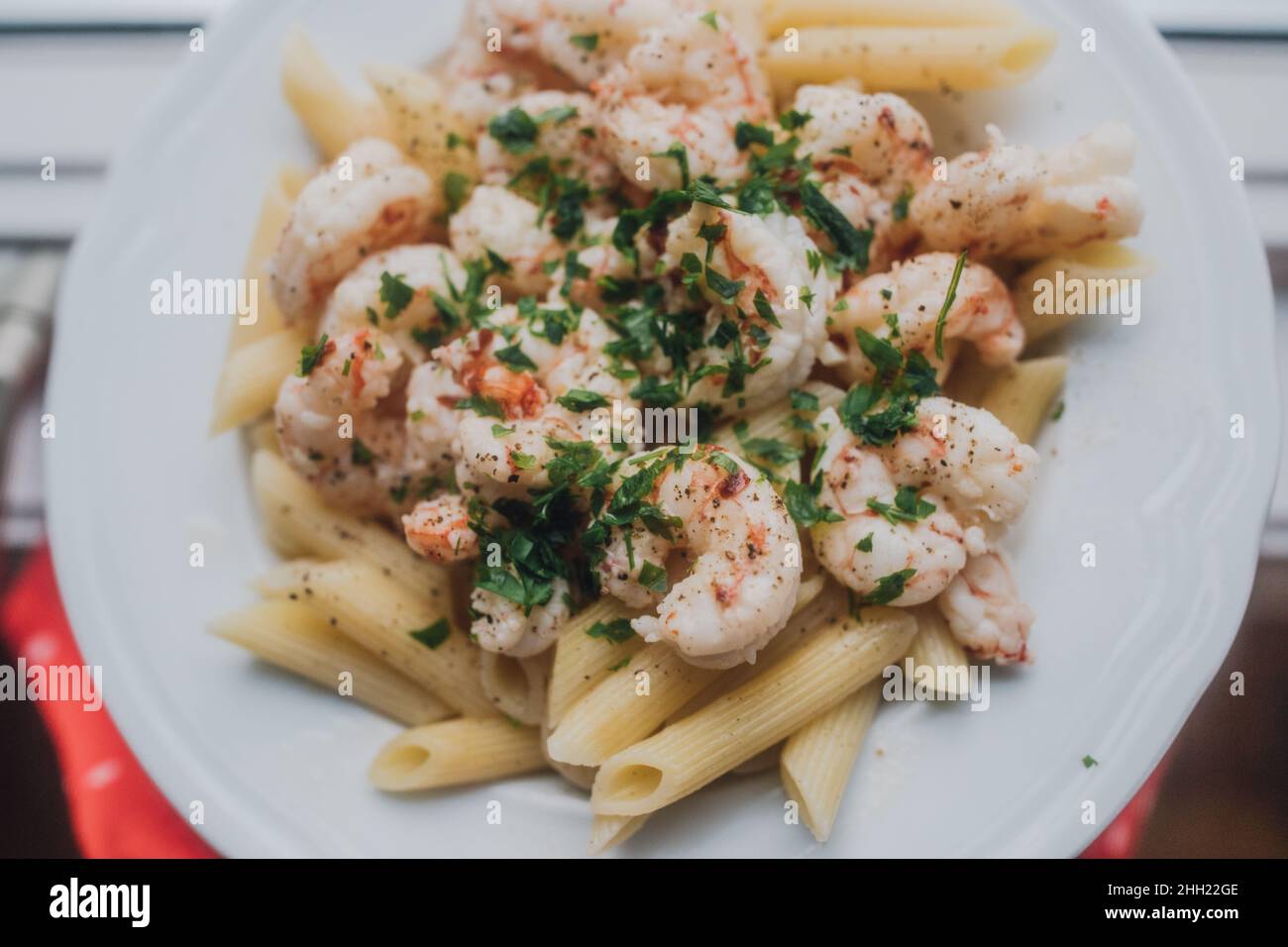 shrimp scampi with penne pasta Stock Photo - Alamy