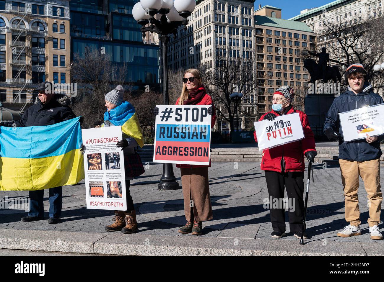 New York, United States. 22nd Jan, 2022. Protesters hold a Stand with Ukraine rally against Russian aggression on Union Square. Protesters held posters accusing Russia of crimes against Ukraine. They were also holding flags by Belarus and Georgia, symbolizing Russian interference with those countries. (Photo by Lev Radin/Pacific Press) Credit: Pacific Press Media Production Corp./Alamy Live News Stock Photo