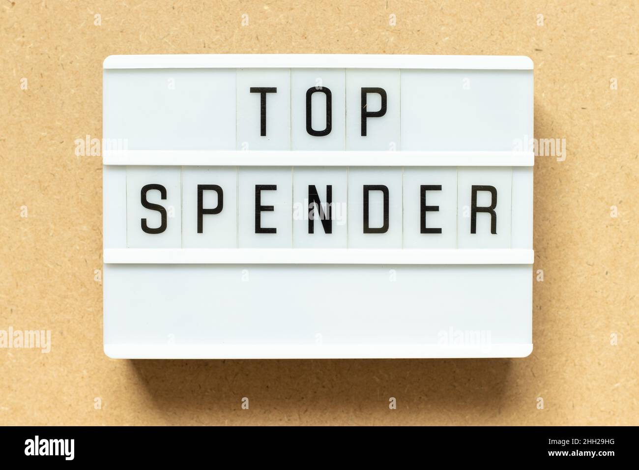 Lightbox with word top spender on wood background Stock Photo