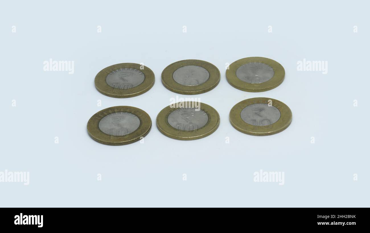 Indian Rupee Coins. Six ten rupee coins. On a white background Stock ...