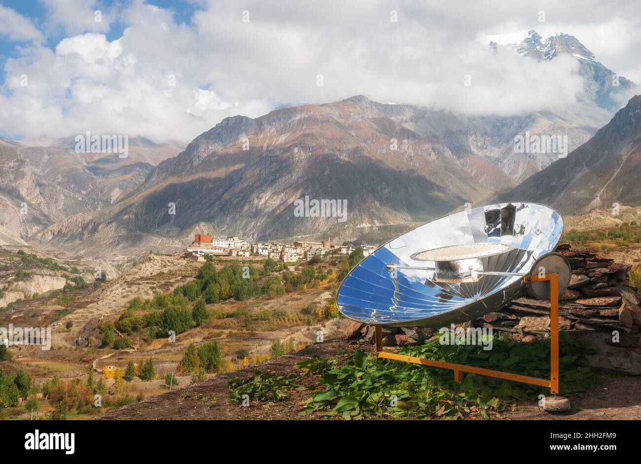 Solar cooker in Nepal Himalayan landscape. Use of renewable energy, ecology concept Stock Photo