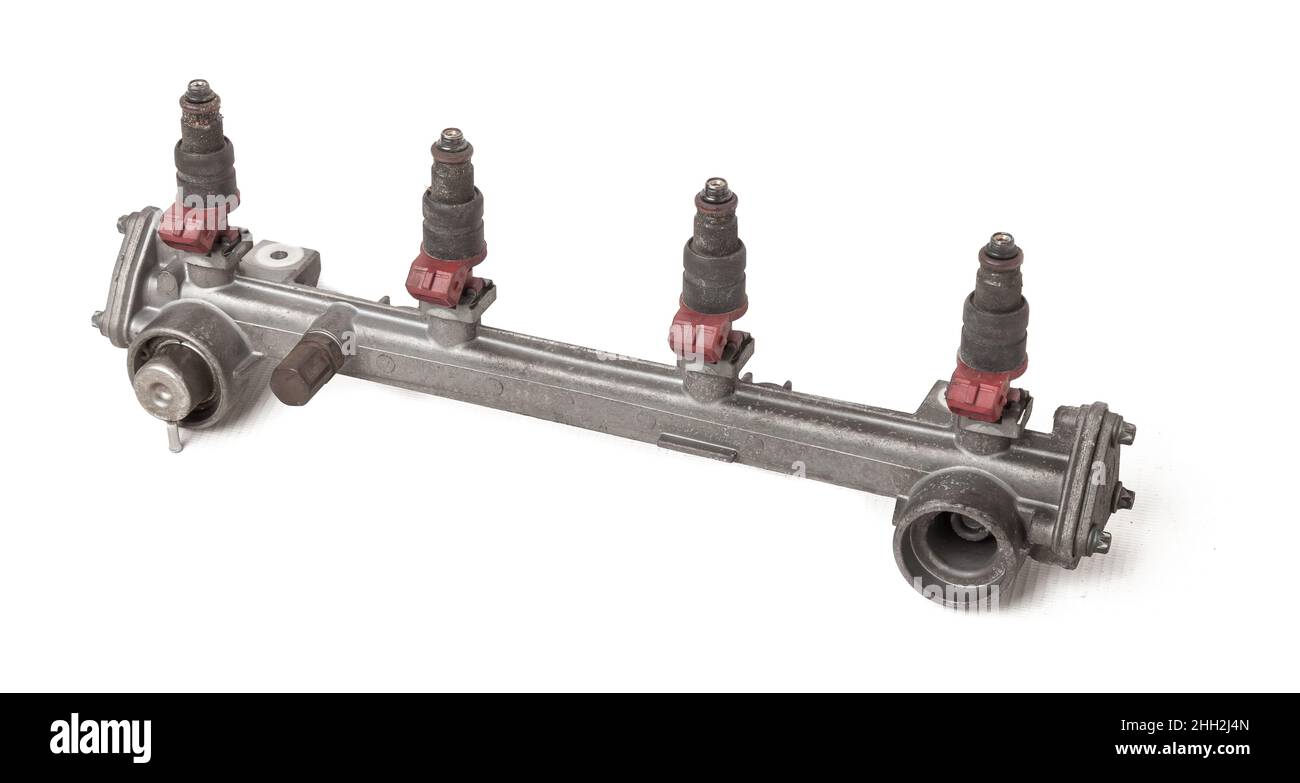 Close-up on a car fuel rail with injectors for supplying gasoline to a ...