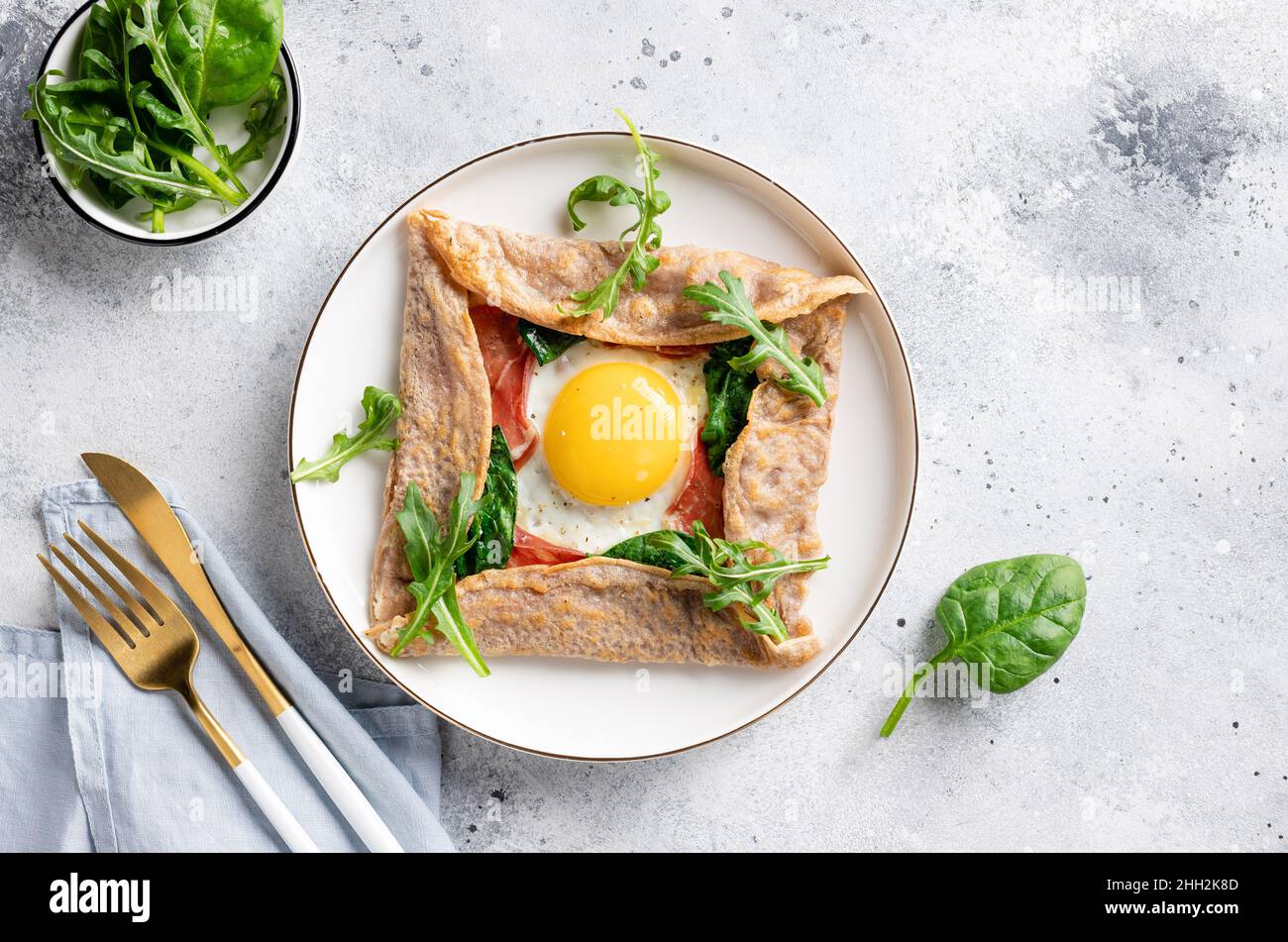 French buckwheat crepe with egg, ham and spinach Stock Photo Alamy