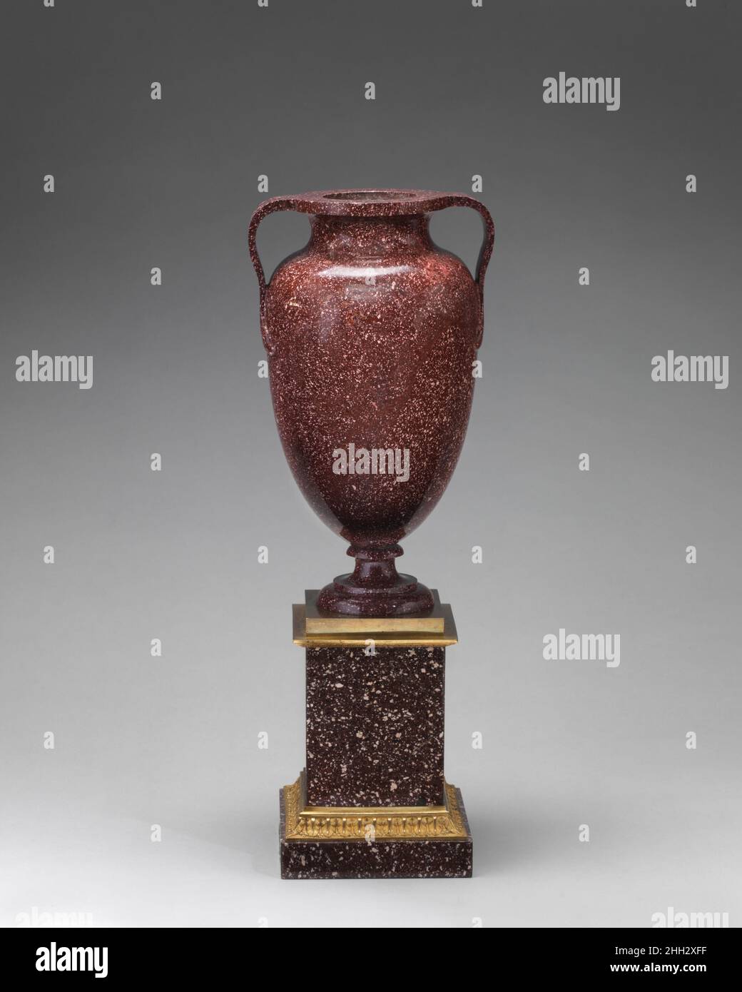 A Porphyry Urn Form Raised on Square Base A Porphyry Urn Form Raised on Square Base