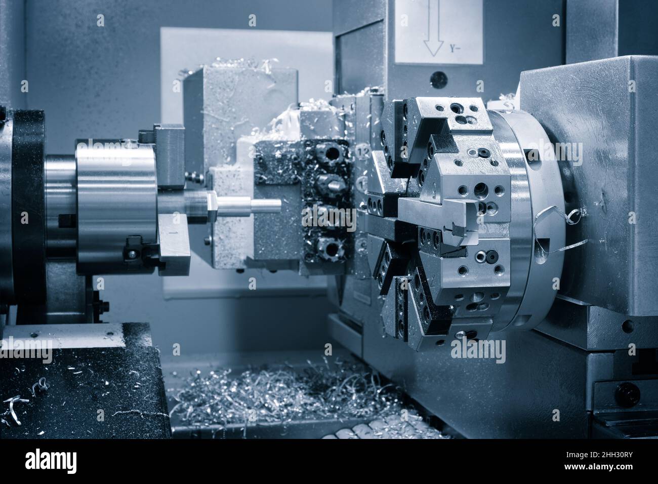 Metal machine tools industry. CNC turning machine highspeed cutting is operation Stock Photo